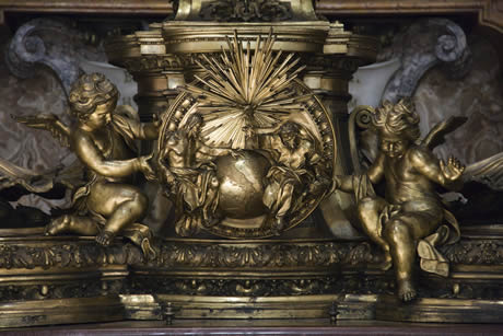 Sculpture of cherubs and creation in Saint Peter s basilica Rome photo