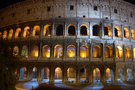 The Colosseum by night in Rome photo