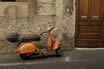 Scooter Parked In A Narrow Old Street Of Rome